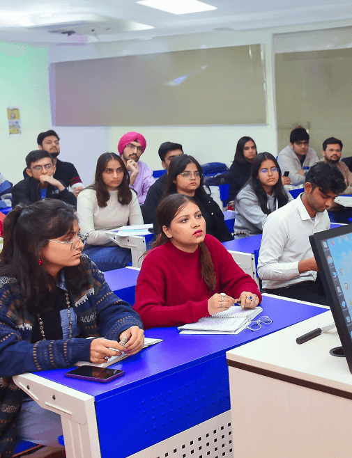 Students attending academic course in classroom